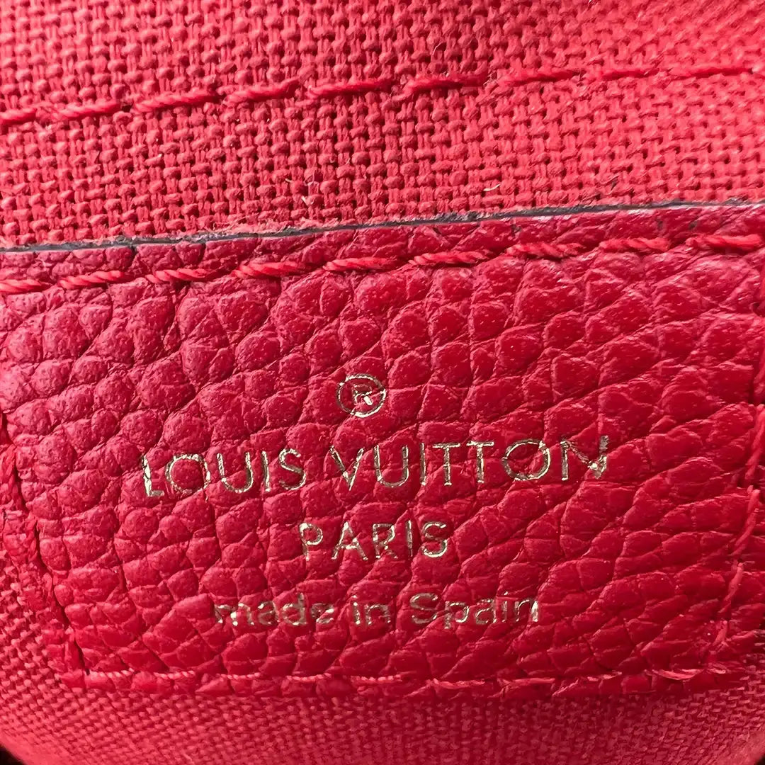 Louis Vuitton Pallas Clutch Made in Label