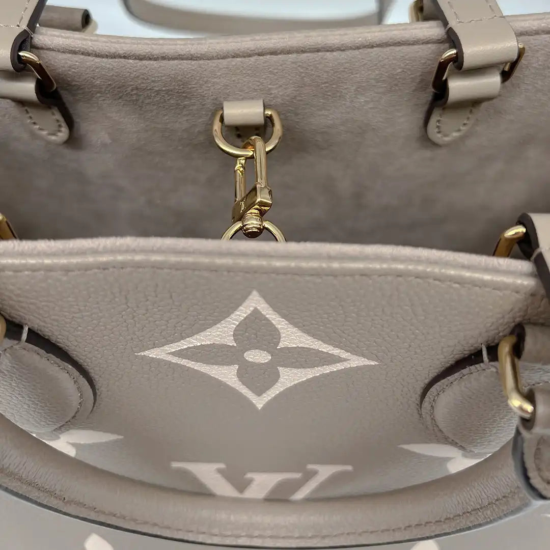 Louis Vuitton Onthego MM mittelgroß Tourterelle / Creme Empreinte Leder Fullset / wie neu - Echtheitscheck