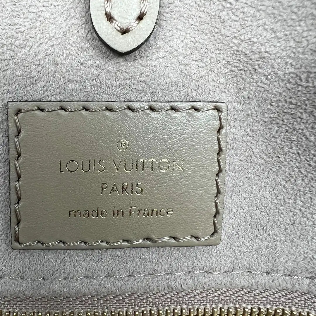 Louis Vuitton Onthego MM mittelgroß Tourterelle / Creme Empreinte Leder Fullset / wie neu - Echtheitscheck