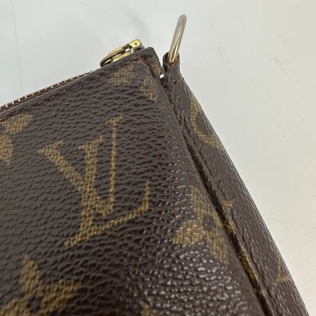 Louis Vuitton Pochette Accessoires Monogram Canvas / gut Louis Vuitton