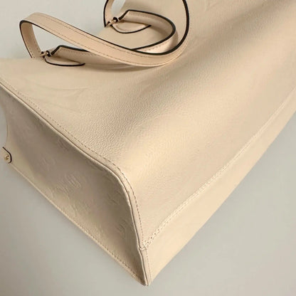 Louis Vuitton Onthego MM mittelgroß  Creme Empreinte Leder Fullset / sehr gut Louis Vuitton