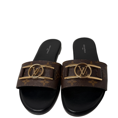 Louis Vuitton Monogram Lock it Flat Mules Größe / 39 Louis Vuitton