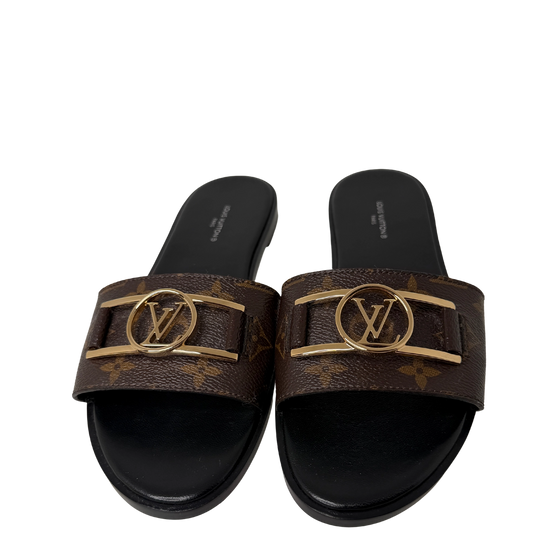 Louis Vuitton Monogram Lock it Flat Mules Größe / 39 Louis Vuitton
