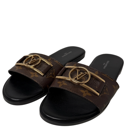 Louis Vuitton Monogram Lock it Flat Mules Größe / 39 Louis Vuitton
