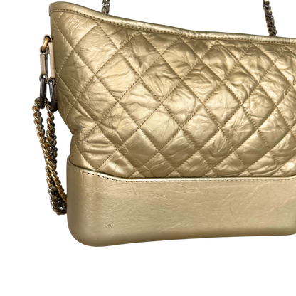 Chanel Gabrielle Hobo Bag aus gestepptem Kalbsleder Gold / sehr gut Echtheitscheck