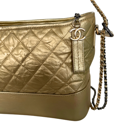 Chanel Gabrielle Hobo Bag aus gestepptem Kalbsleder Gold / sehr gut Echtheitscheck