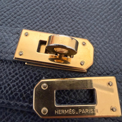 Hermes Kelly Long Wallet schwarz goldene Hardware Epsom Leder / sehr gut Hermès