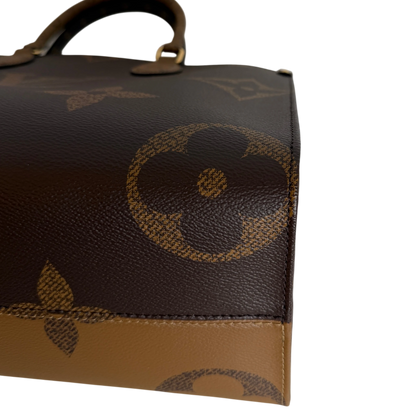 Louis Vuitton OnTheGo MM Monogram Giant Reverse Canvas Braun Gold