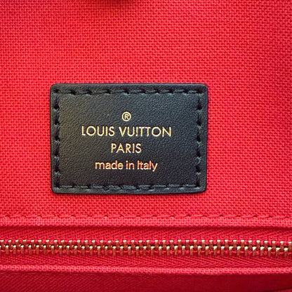 Louis Vuitton OnTheGo MM Monogram Giant Reverse Canvas Braun Gold