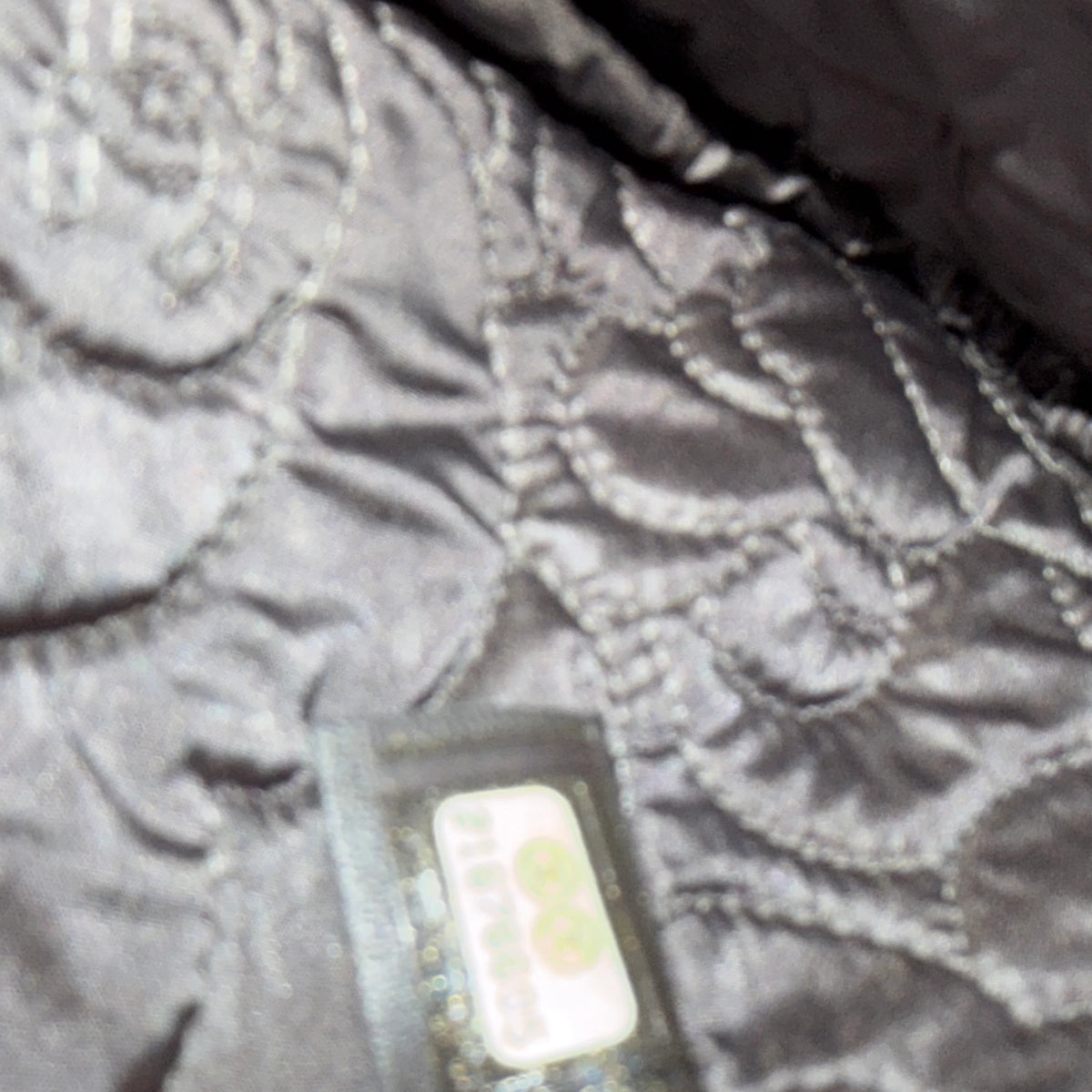 Chanel O Case Medium Camellia Lammleder Schwarz Gold Clutch
