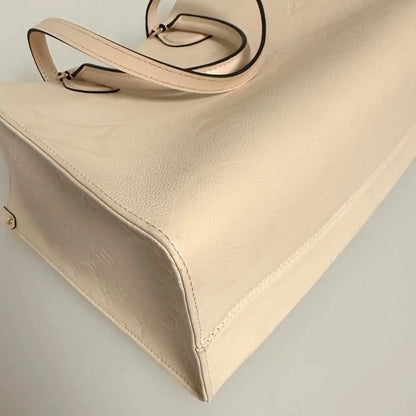 Louis Vuitton Onthego MM mittelgroß  Creme Empreinte Leder Fullset / sehr gut Louis Vuitton