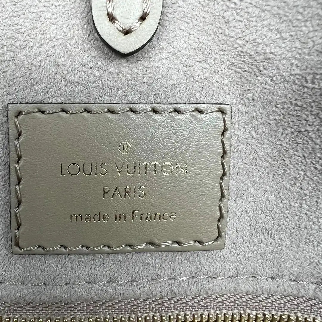 Louis Vuitton Onthego MM mittelgroß Tourterelle / Creme Empreinte Leder Fullset / wie neu - Echtheitscheck