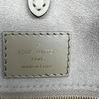 Louis Vuitton Onthego MM mittelgroß Tourterelle / Creme Empreinte Leder Fullset / wie neu - Echtheitscheck