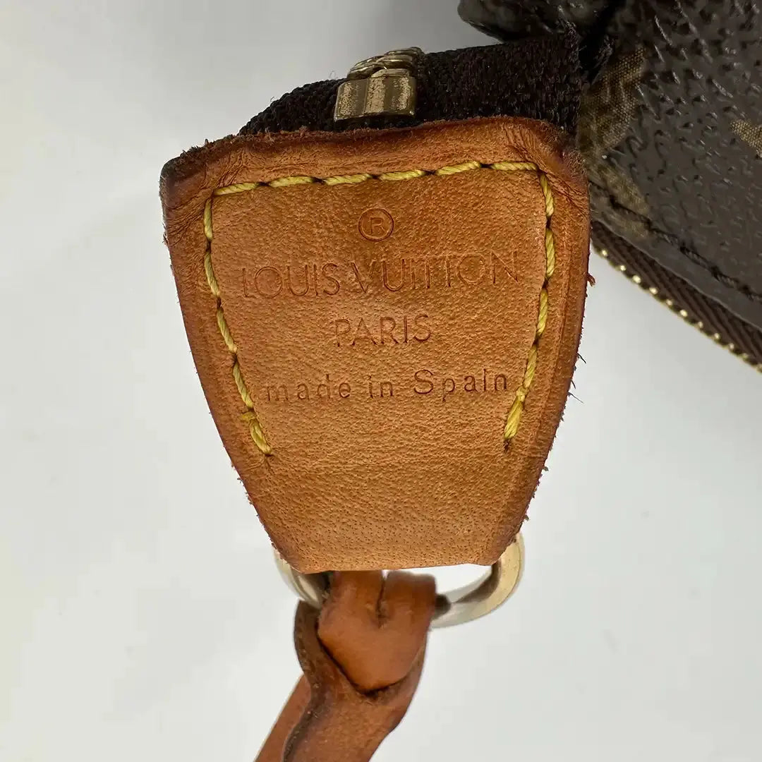 Louis Vuitton Pochette Accessoires Monogram Canvas braun / gut Louis Vuitton