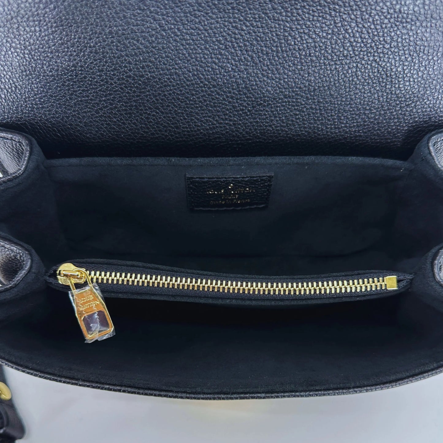 Louis Vuitton Pochette Métis East West Empreinte Leder schwarz / beige M46596 Fullset / neuwertig Louis Vuitton