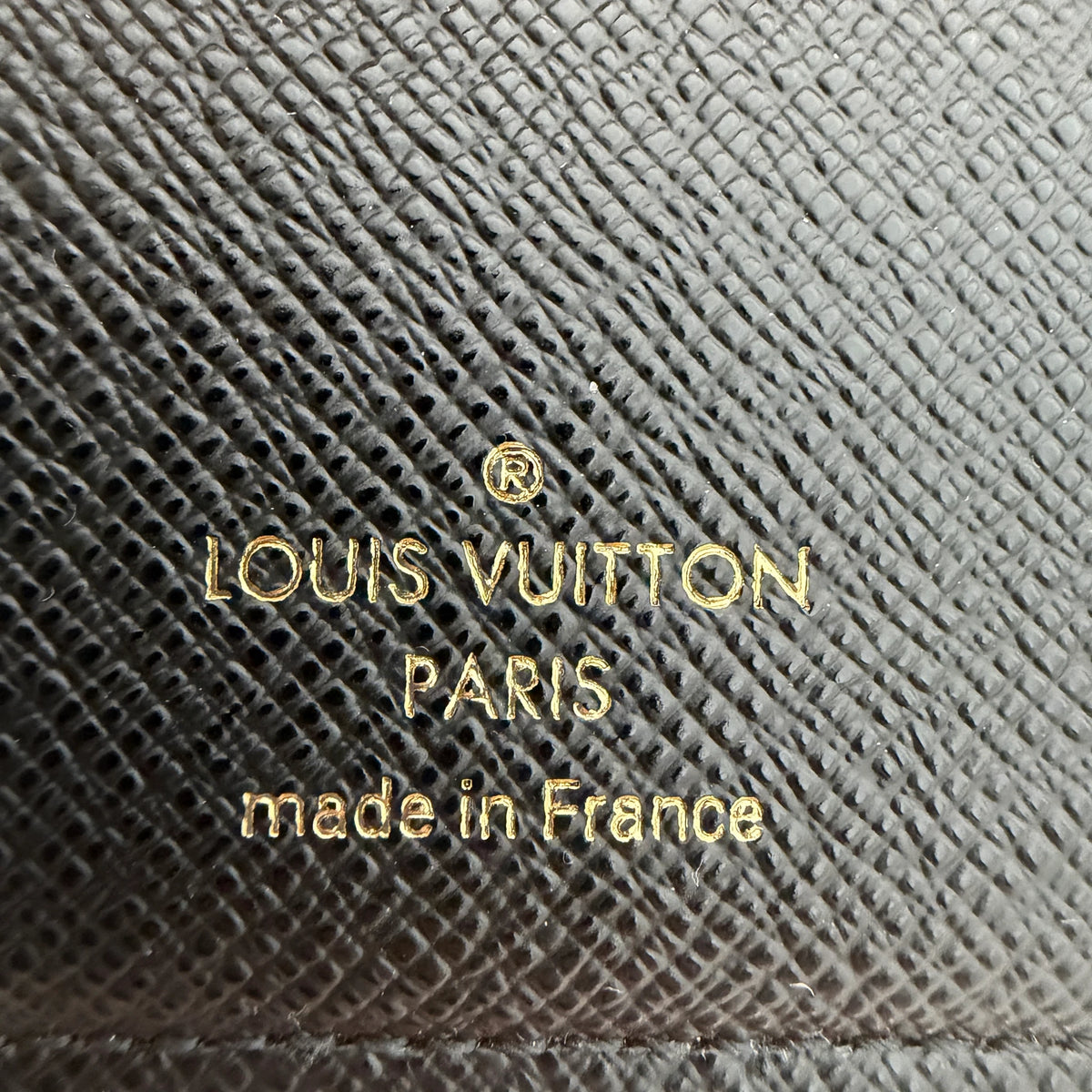 Louis Vuitton Lou Wallet Monogram Reverse Canvas Braun Gold
