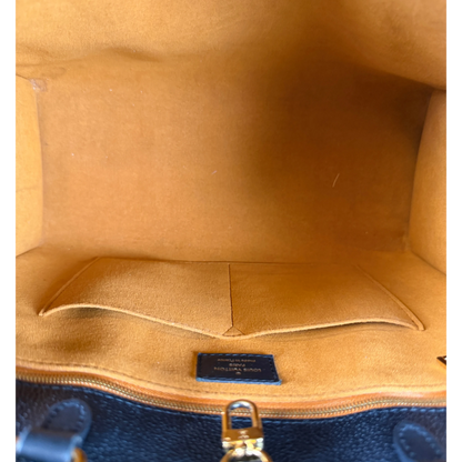 Louis Vuitton OnTheGo MM Monogram Empreinte Leather Black Gold