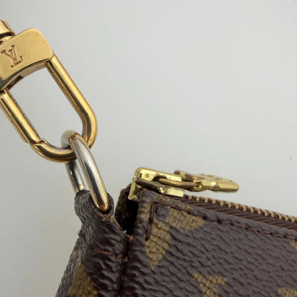Louis Vuitton Pochette Accessoires Monogram Canvas braun / sehr gut Louis Vuitton