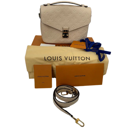 Louis Vuitton Pochette Métis Empreinte Leder Creme neuwertig / Fullset Louis Vuitton