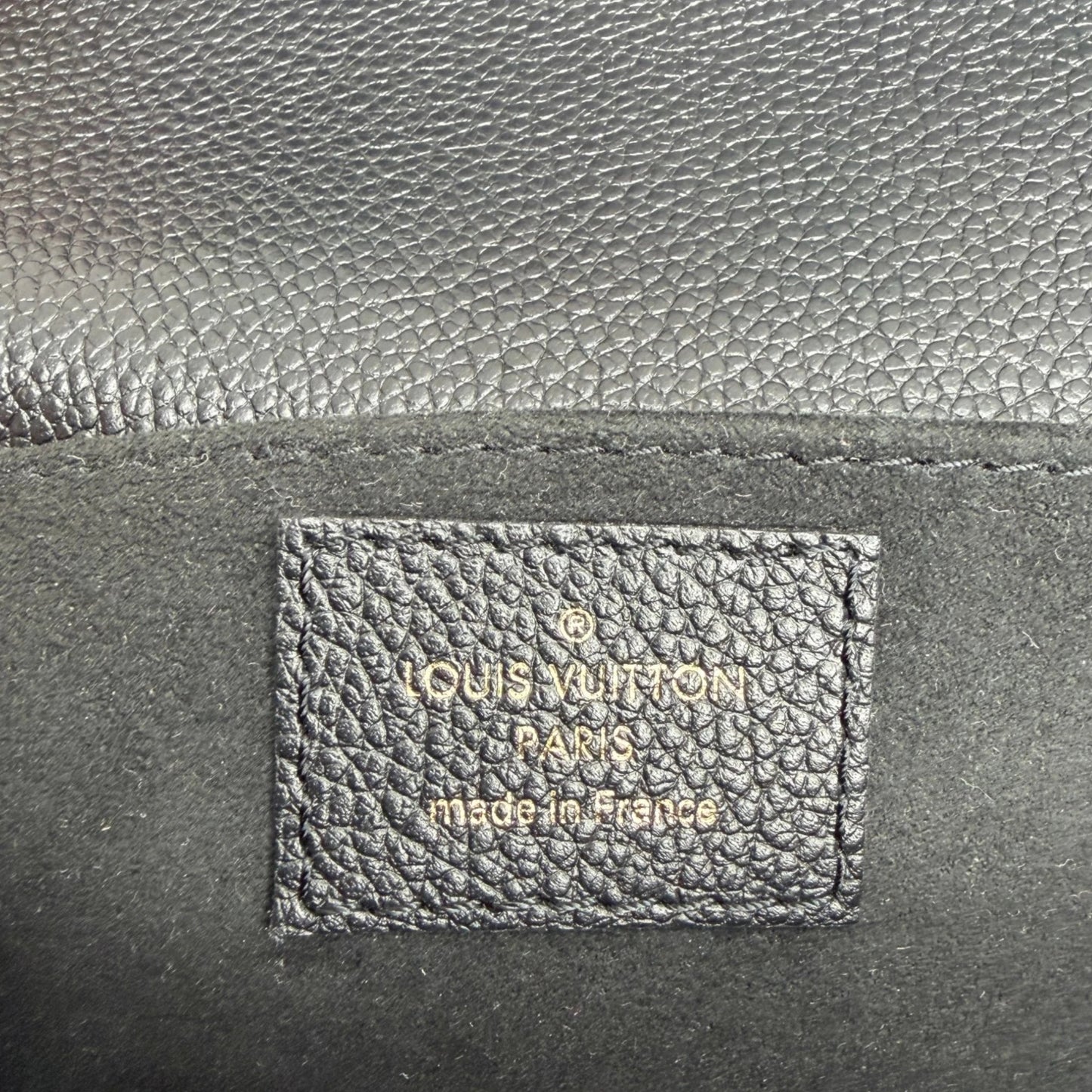 Louis Vuitton Pochette Métis East West Empreinte Leder schwarz / sehr gut Louis Vuitton