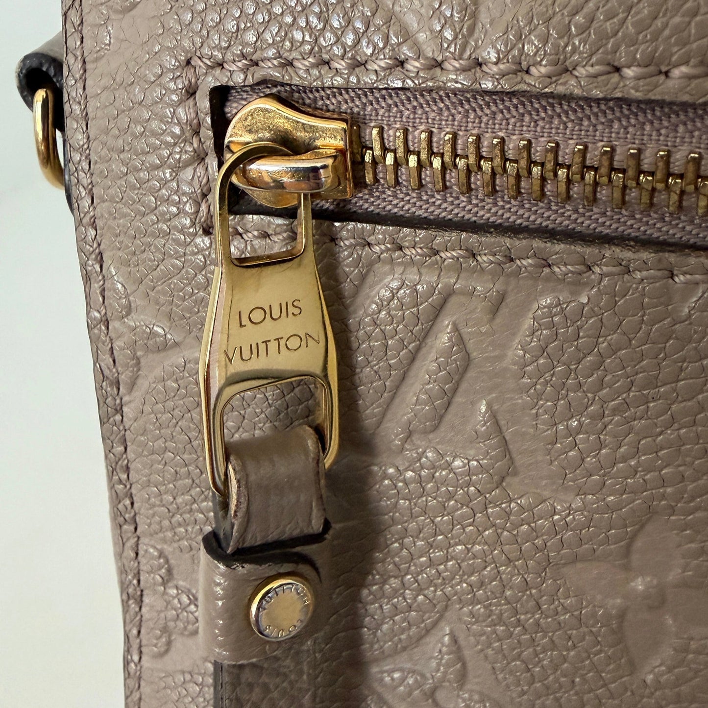 Louis Vuitton Pochette Métis Empreinte Leder tourterelle / gut Louis Vuitton