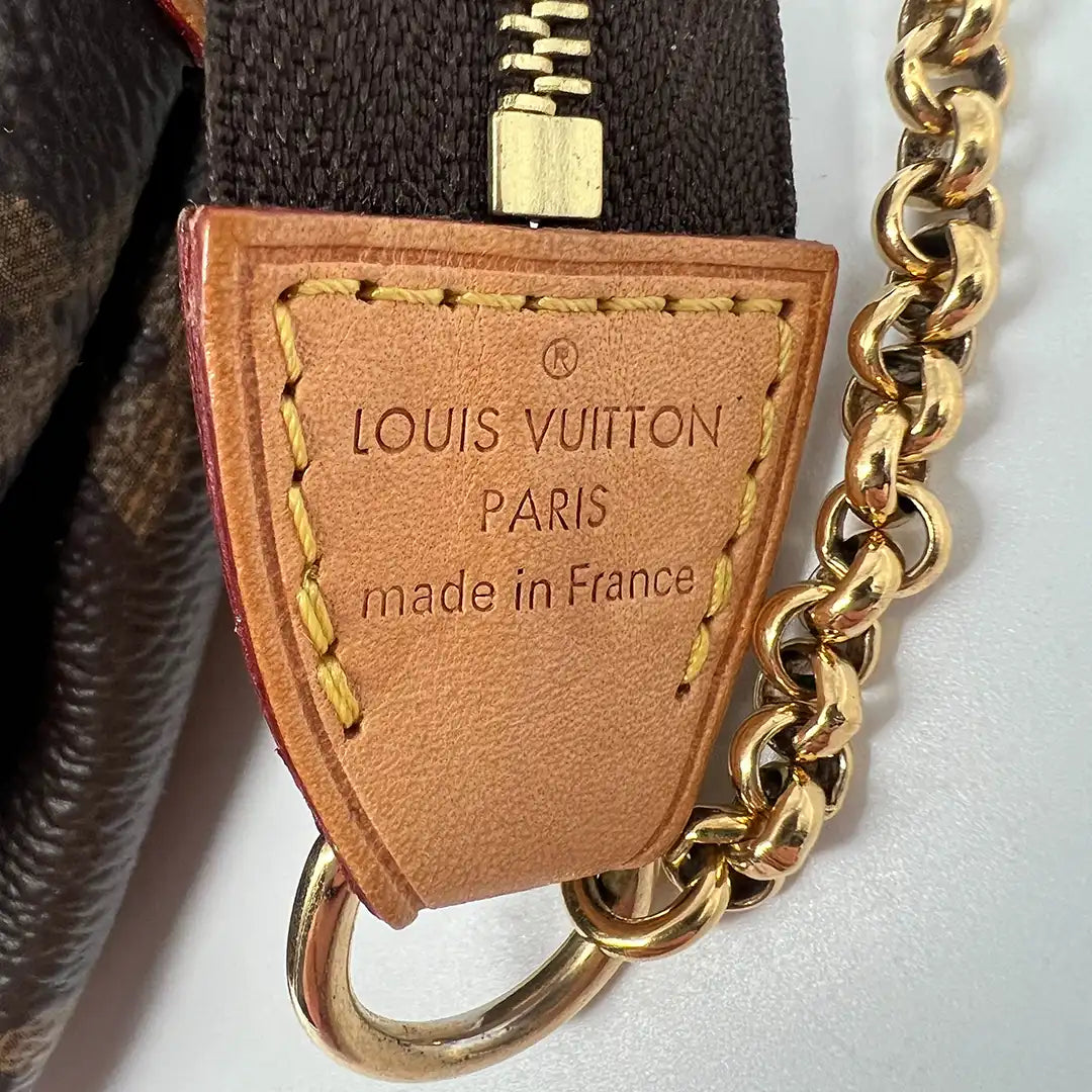 Louis Vuitton Pochette Eva Monogramm Canvas / sehr gut Louis Vuitton